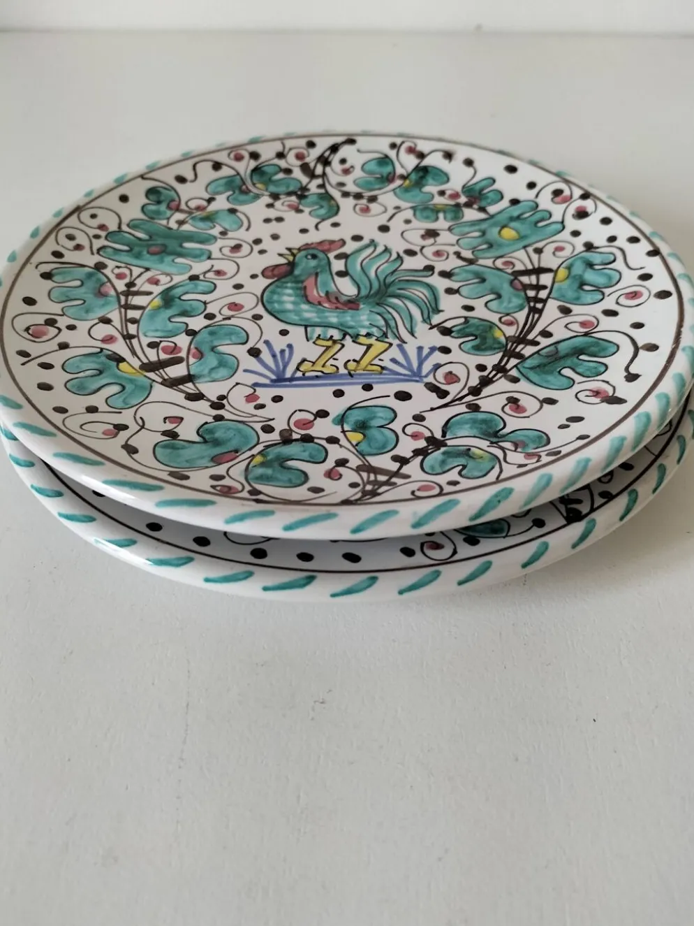 Duo d’assiettes Deruta Etrusca coq vert majolique italienne