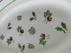 Duo de raviers en terre de fer – fleurs stylisées années 50