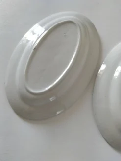 Duo de raviers en terre de fer – fleurs stylisées années 50