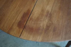 Elégante table ronde en teck avec rallonge