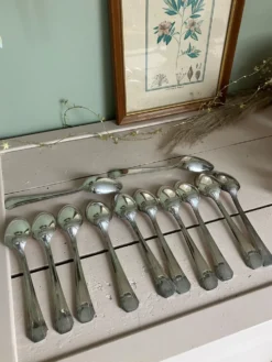 Ensemble de 12 anciennes cuillères à soupe Arr déco Argental