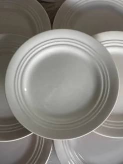 Ensemble de 10 assiettes à dessert anciennes en faïence rose pâle