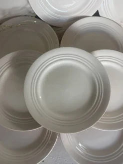 Ensemble de 10 assiettes à dessert anciennes en faïence rose pâle