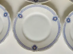 Ensemble de 7 assiettes à dessert Muller Selb