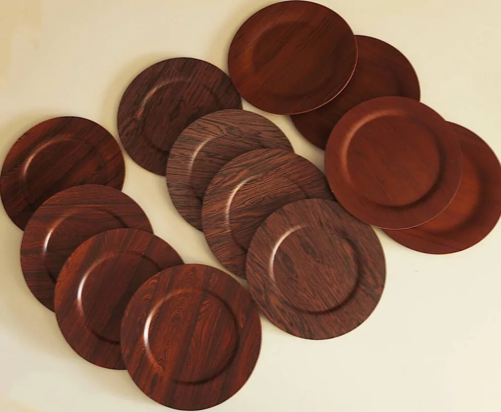 Ensemble de 12 assiettes en contreplaqué de rosewood et teck par Mossback, Danemark, années 1960.