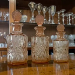 Ensemble de 3 bouteilles vintage en verre rosé avec bouchons