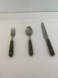 Ensemble de couteau, fourchette et cuillère en acier inoxydable Edwin Blyde & Co, années 1950.