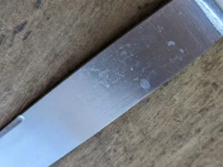 Ensemble de 10 couteaux de table vintages inox et bakélite