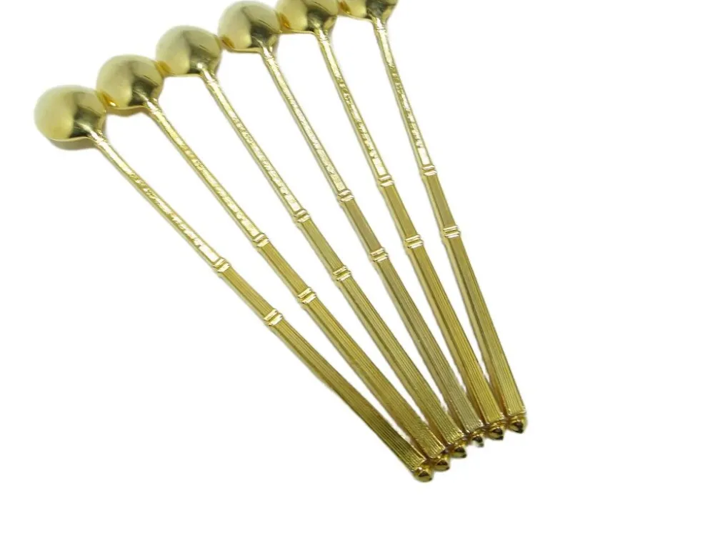 Ensemble de cuillères à cocktail Art Déco, métal doré, France, années 1950.