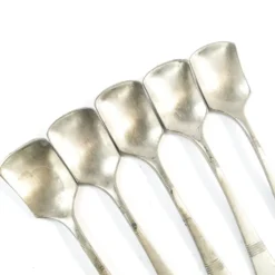 Ensemble de 5 cuillères à glace, métal blanc argenté, Allemagne, années 1930.