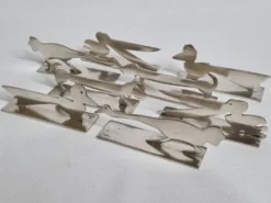 Ensemble de 8 porte-couteaux animaliers Yorel Art Déco métal argenté 1930
