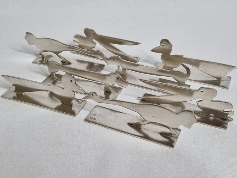 Ensemble de 8 porte-couteaux animaliers Yorel Art Déco métal argenté 1930