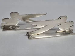 Ensemble de 8 porte-couteaux animaliers Yorel Art Déco métal argenté 1930