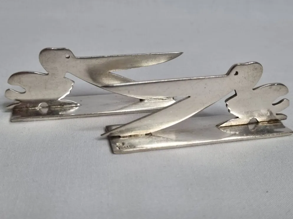 Ensemble de 8 porte-couteaux animaliers Yorel Art Déco métal argenté 1930