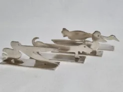 Ensemble de 8 porte-couteaux animaliers Yorel Art Déco métal argenté 1930