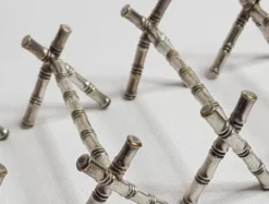 Ensemble de six porte-couteaux en métal argenté à l'imitation du bambou