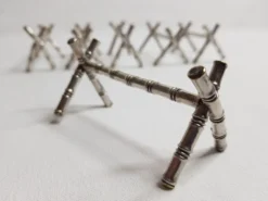 Ensemble de six porte-couteaux en métal argenté à l'imitation du bambou