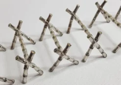 Ensemble de six porte-couteaux en métal argenté à l'imitation du bambou