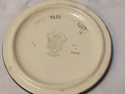 Ensemble émaux de Longwy dessous de plat et de bouteille décor floral