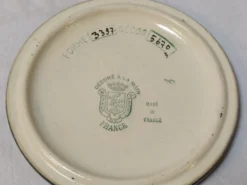 Ensemble émaux de Longwy dessous de plat et de bouteille décor floral