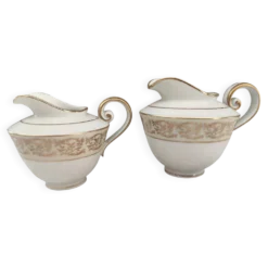Ensemble pot à lait et crémier en porcelaine de Limoges