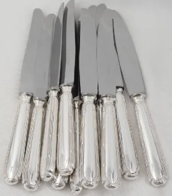 Ercuis Trianon, Rubans, 12 couteaux de table métal argenté, excellent état