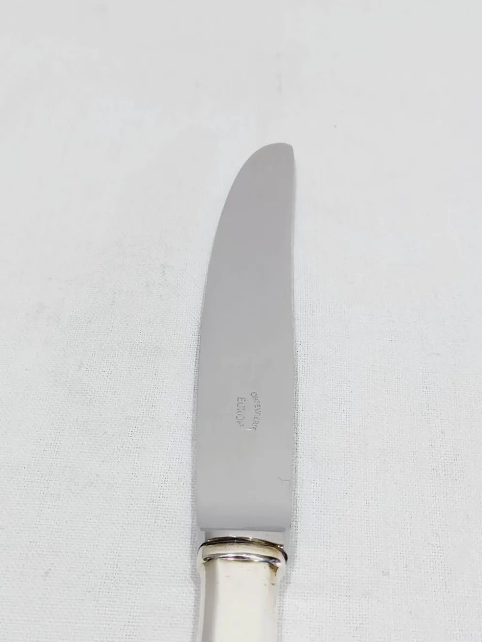 Europ - 12 Couteaux en métal argenté Uniplat