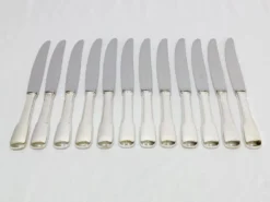 Europ - 12 Couteaux en métal argenté Uniplat