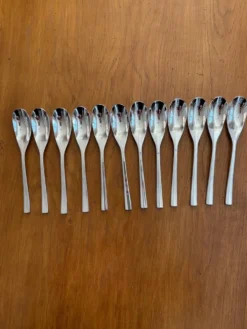 Exceptionnelle ménagère Couzon Neuvième Art – 123 pièces – inox 18/10