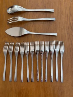 Exceptionnelle ménagère Couzon Neuvième Art – 123 pièces – inox 18/10