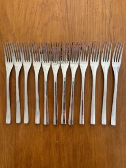 Exceptionnelle ménagère Couzon Neuvième Art – 123 pièces – inox 18/10