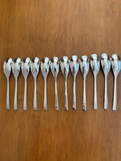 Exceptionnelle ménagère Couzon Neuvième Art – 123 pièces – inox 18/10