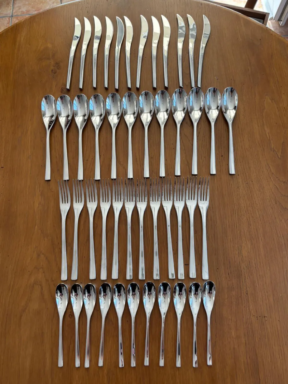 Exceptionnelle ménagère Couzon Neuvième Art – 123 pièces – inox 18/10