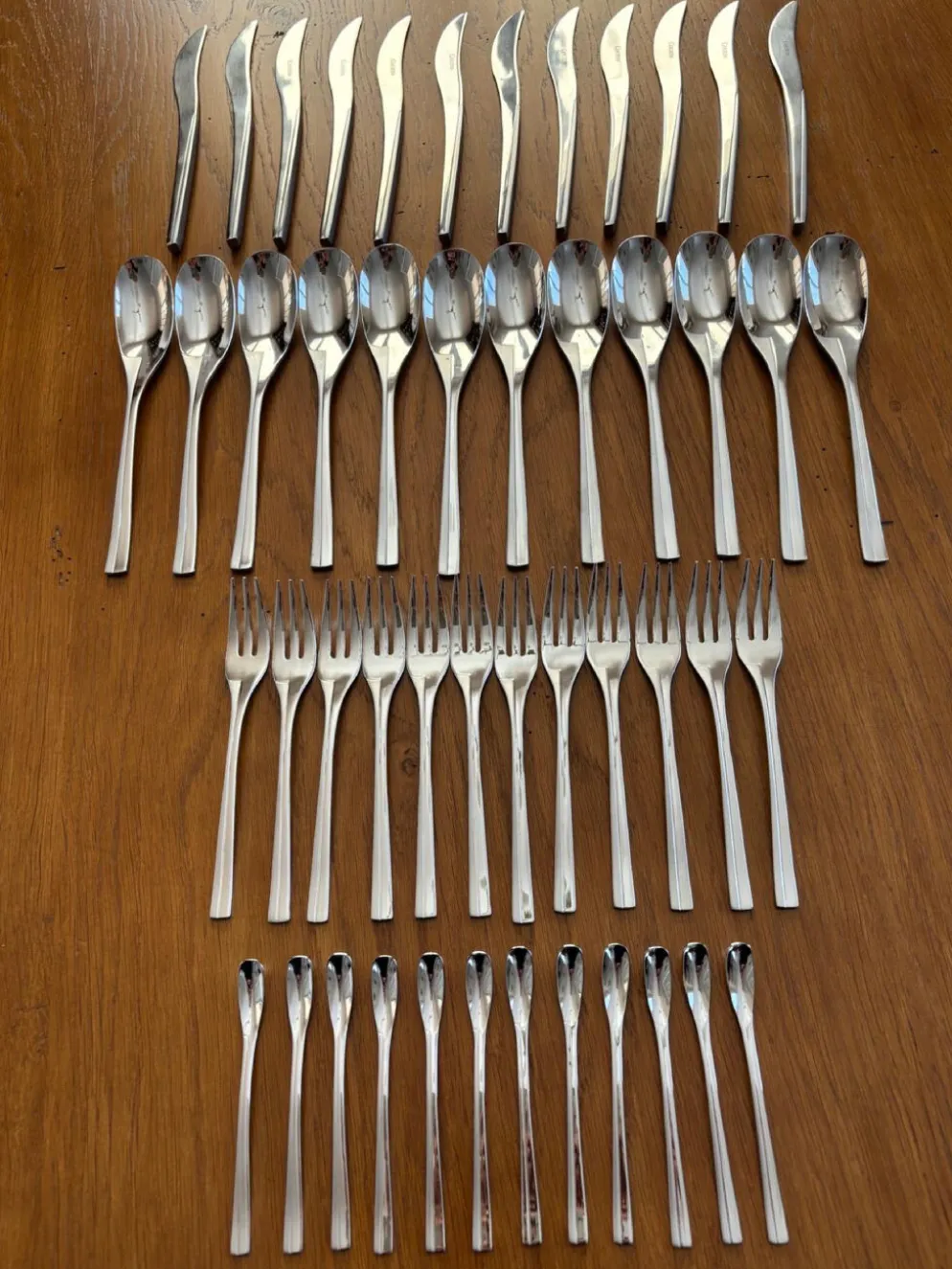 Exceptionnelle ménagère Couzon Neuvième Art – 123 pièces – inox 18/10