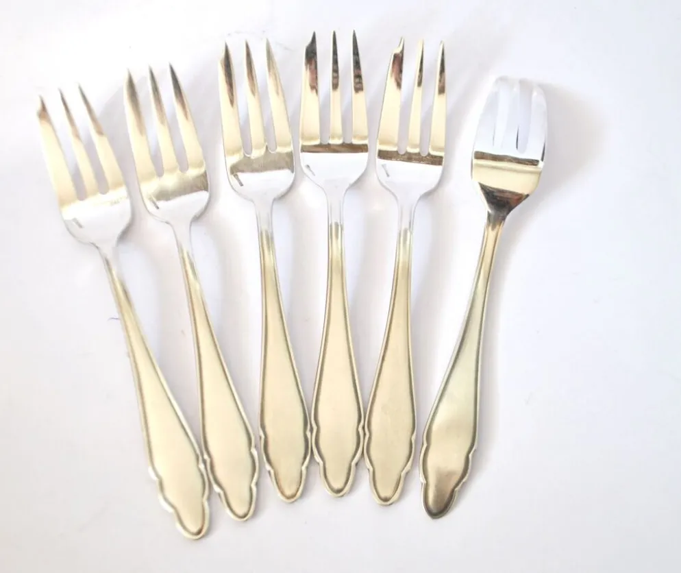 6 fourchettes à dessert modernistes en métal argenté chantourné DEETJEN