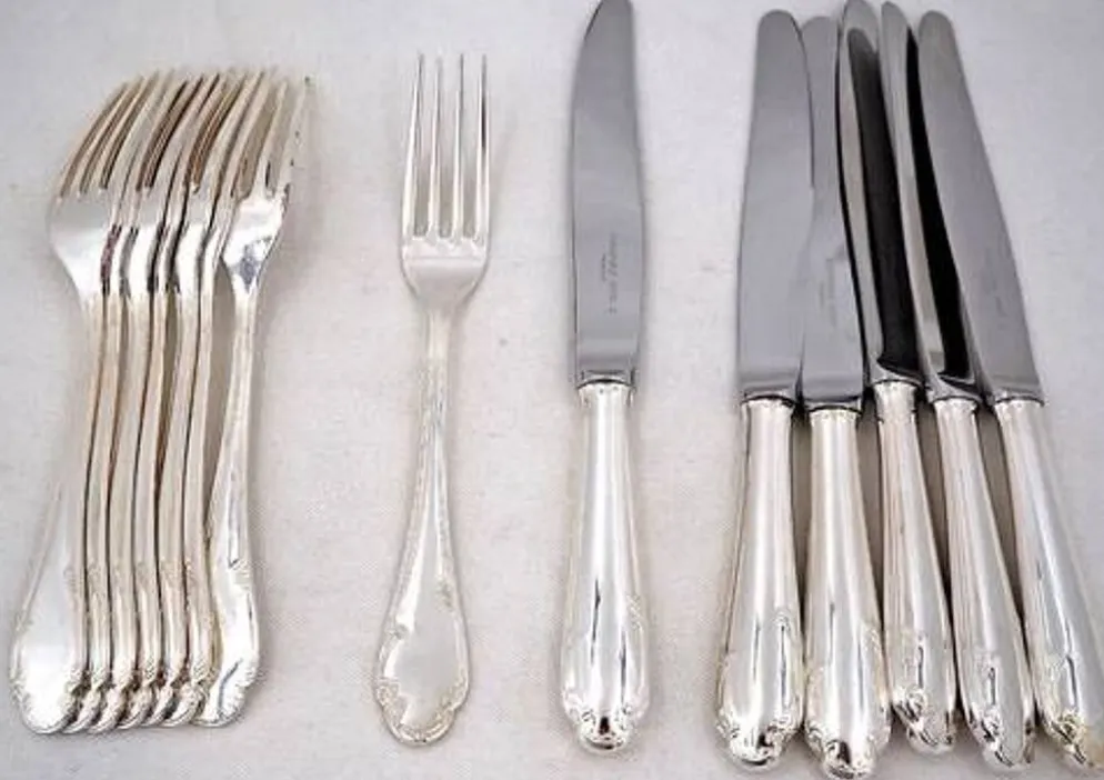 8 fourchettes et 6 couteaux de table Christofle Hotel