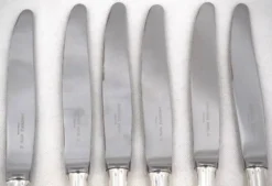 8 fourchettes et 6 couteaux de table Christofle Hotel