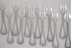 12 fourchettes à huitres en métal argenté Christofle Rubans