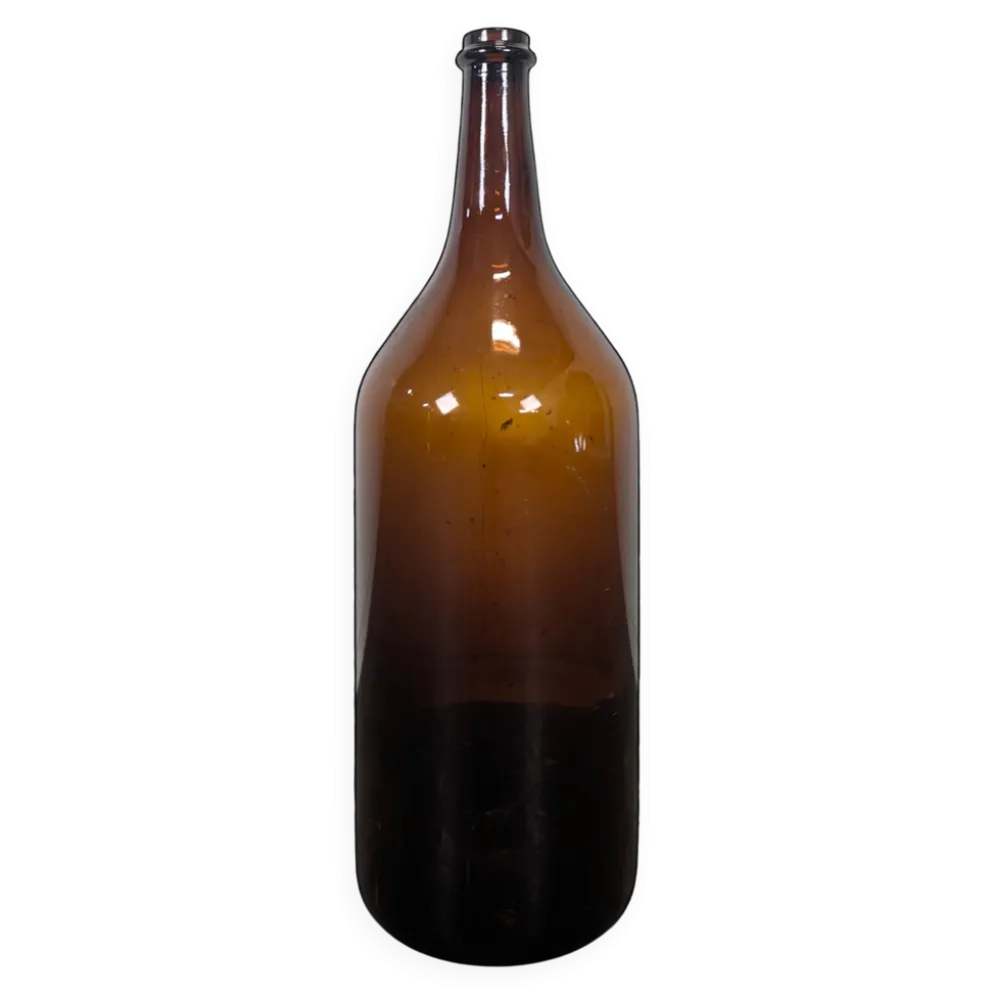 Grande bouteille ancienne en verre soufflé ambré