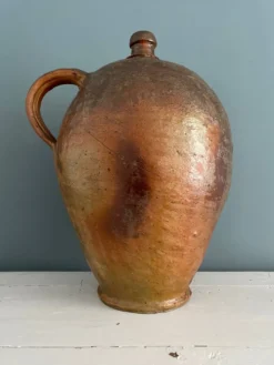 Grande bouteille à huile XIXème en terre vernissée