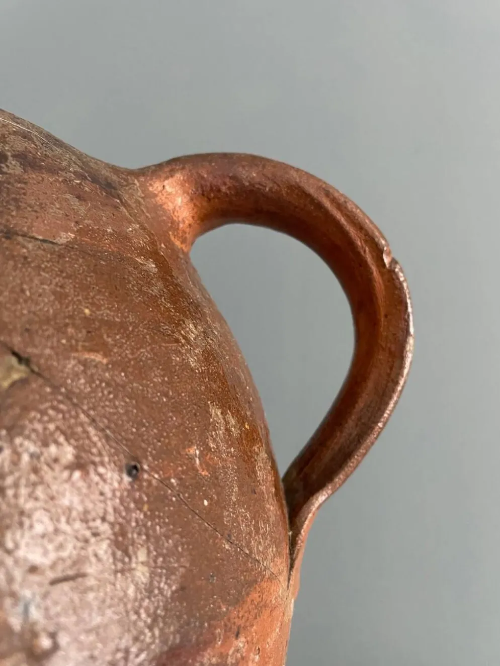 Grande bouteille à huile XIXème en terre vernissée