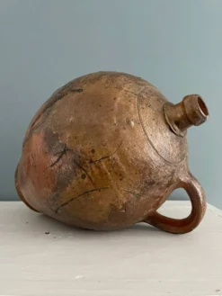 Grande bouteille à huile XIXème en terre vernissée