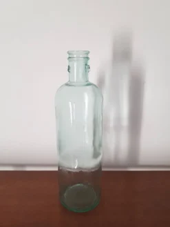 Grande bouteille vintage en verre