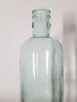 Grande bouteille vintage en verre