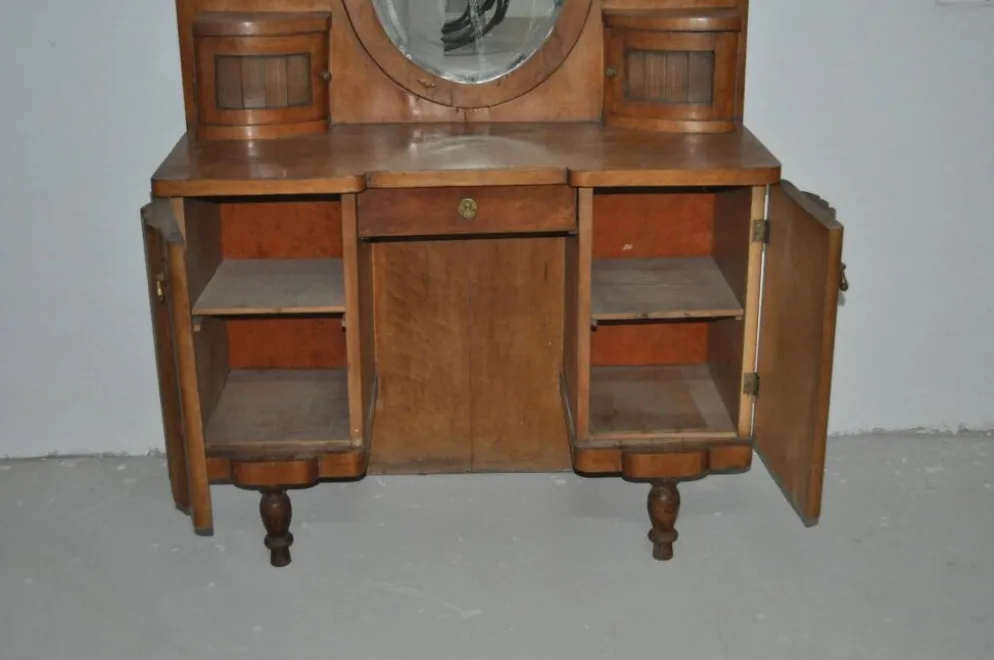Grande coiffeuse vintage en bois marron avec miroir ovale et rangements intégrés