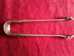 Grande pince a sucre en metal argente style art nouveau