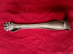 Grande pince a sucre en metal argente style art nouveau