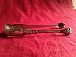 Grande pince a sucre en metal argente style art nouveau
