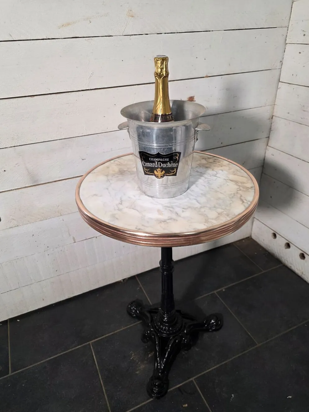 Guéridon de bistrot dessus marbre et laiton pied fonte