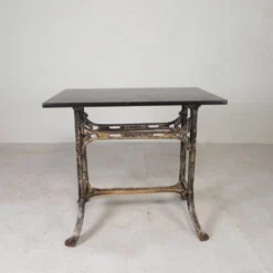 Industrial table, garden table with hard stone slab on cast iron frame, 1930s